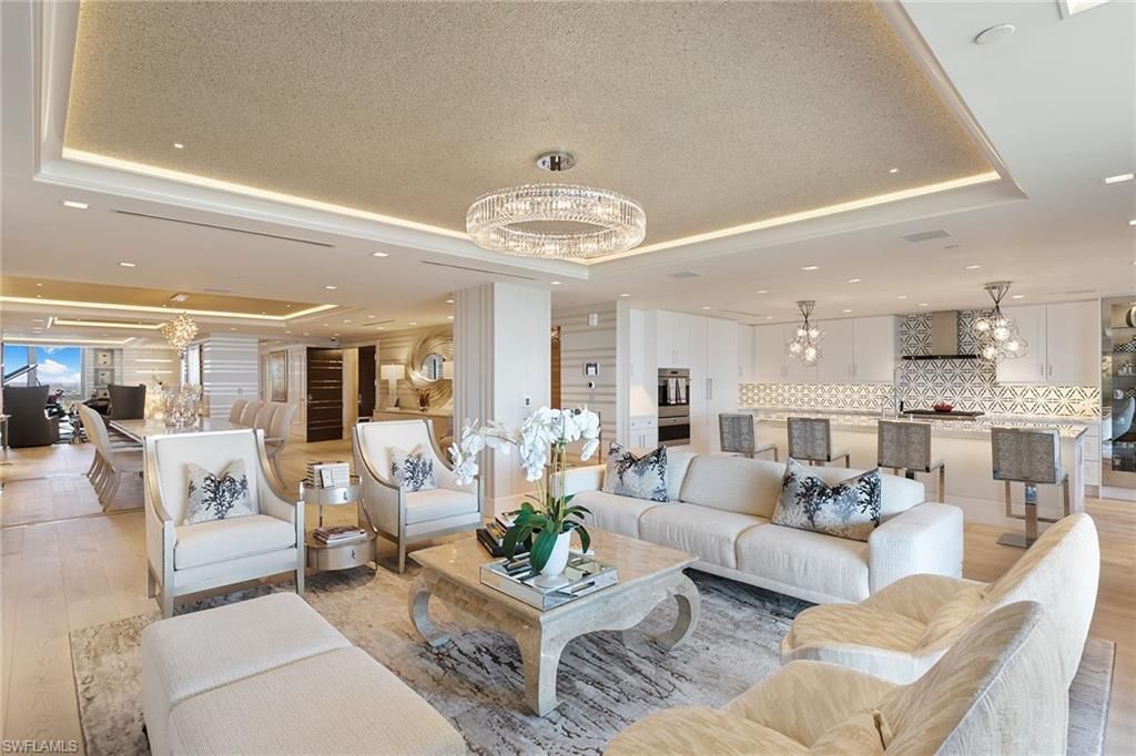 Chandelier, Dining room, Interior, Kitchen, Living room, Pendant Lights, Recessed Lighting, Stainless Steel Appliances, Wood Texture Flooring