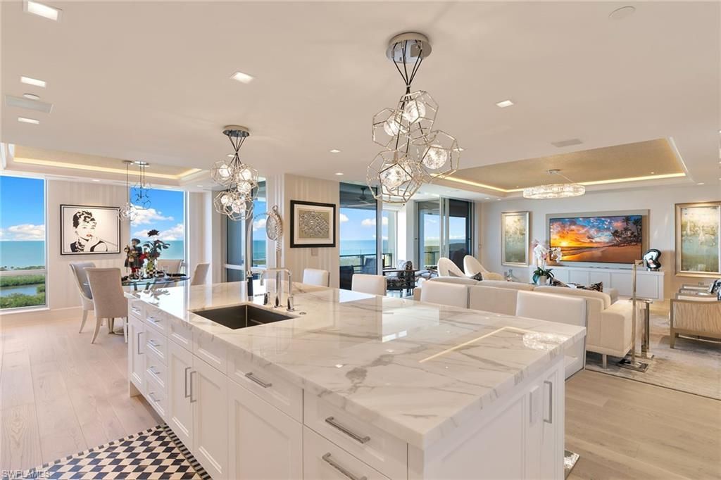 Chandelier, Dining room, Interior, Kitchen, Living room, Pendant Lights, Recessed Lighting, Water, Wood Texture Flooring