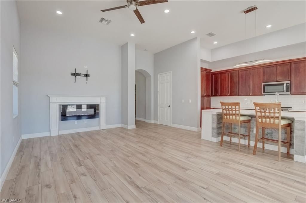 Fireplace, Interior, Kitchen, Pendant Lights, Recessed Lighting, Wood Texture Flooring