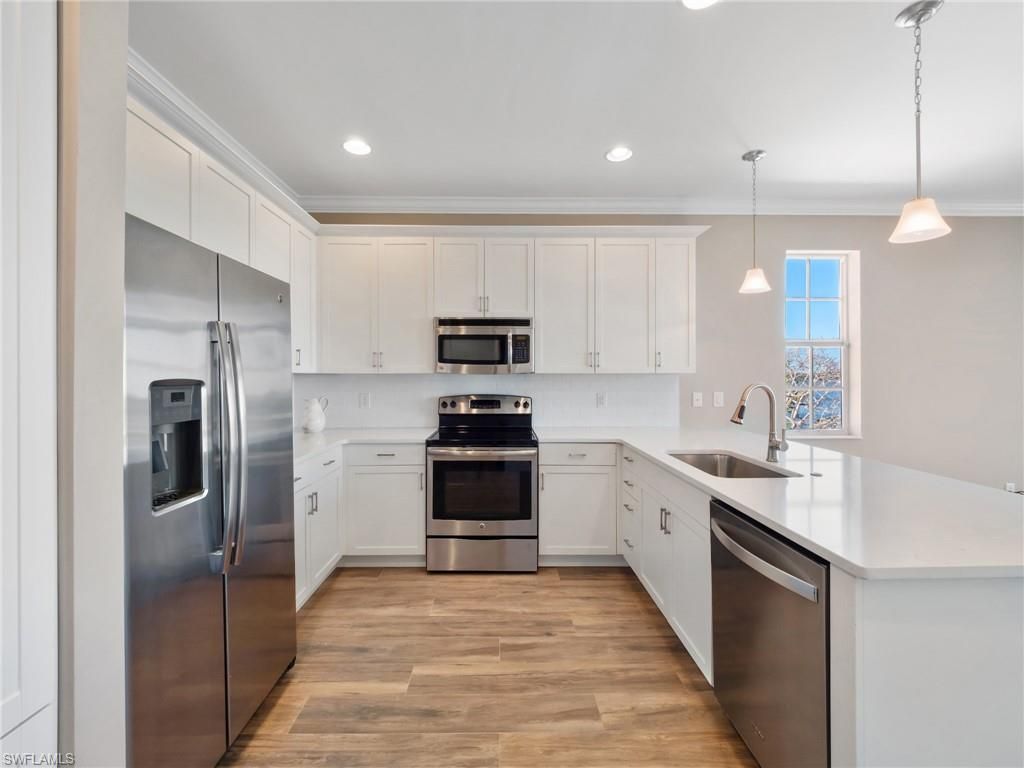 Interior, Kitchen, Pendant Lights, Recessed Lighting, Stainless Steel Appliances, Wood Texture Flooring