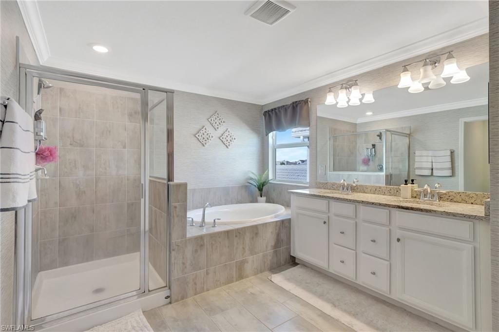Bathroom, Dual Sink Vanities, Glass Shower, Interior, Recessed Lighting, Wood Texture Flooring