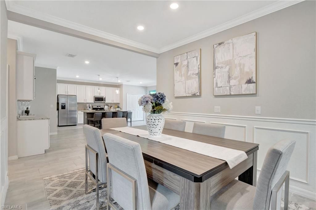 Dining room, Interior, Kitchen, Recessed Lighting, Stainless Steel Appliances, Wood Texture Flooring