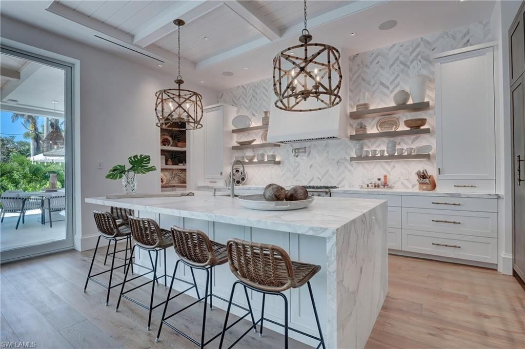 Interior, Kitchen, Marble Walls, Pendant Lights, Recessed Lighting, Stainless Steel Appliances, Wood Texture Flooring