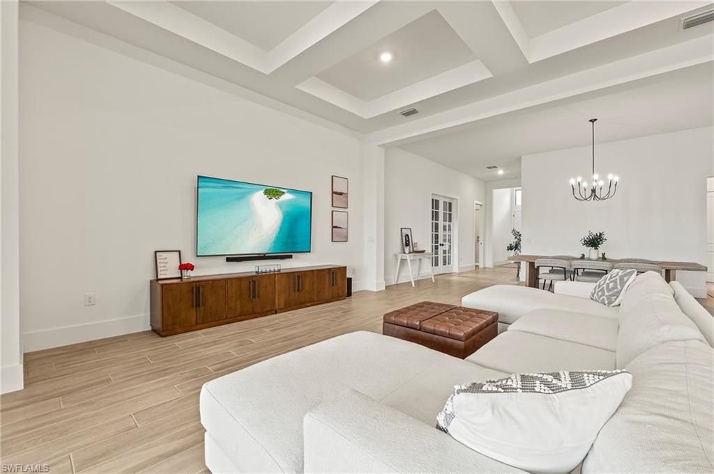 Chandelier, Dining room, Interior, Living room, Recessed Lighting, Wood Texture Flooring