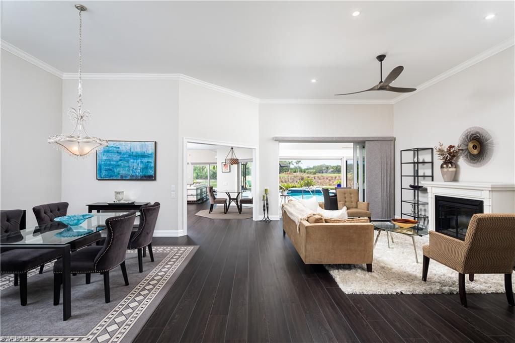 Dining room, Fireplace, Interior, Living room, Pendant Lights, Recessed Lighting, Wood Texture Flooring