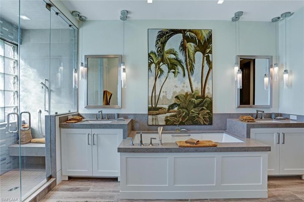 Bathroom, Dual Sink Vanities, Glass Shower, Interior, Pendant Lights, Recessed Lighting, Wood Texture Flooring