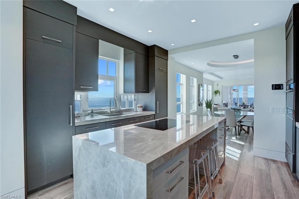 Dining room, Interior, Kitchen, Pendant Lights, Recessed Lighting, Water, Wood Texture Flooring