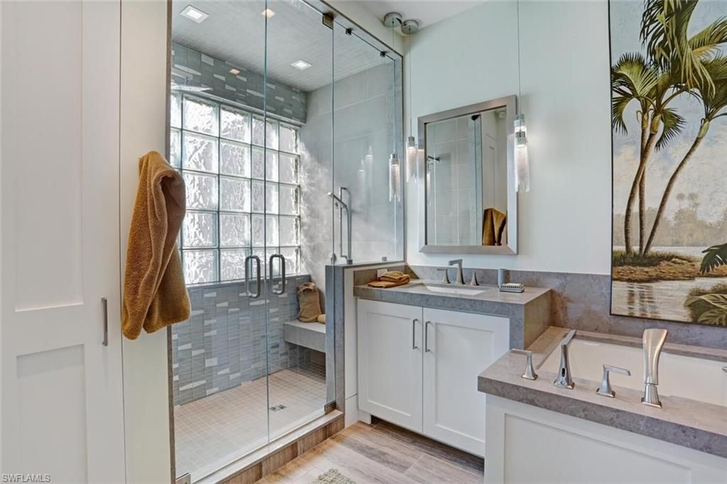 Bathroom, Dual Sink Vanities, Glass Shower, Interior, Recessed Lighting, Wood Texture Flooring