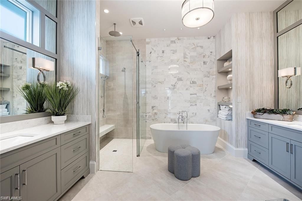Bathroom, Dual Sink Vanities, Free Standing Baths, Glass Shower, Interior, Marble Walls, Recessed Lighting