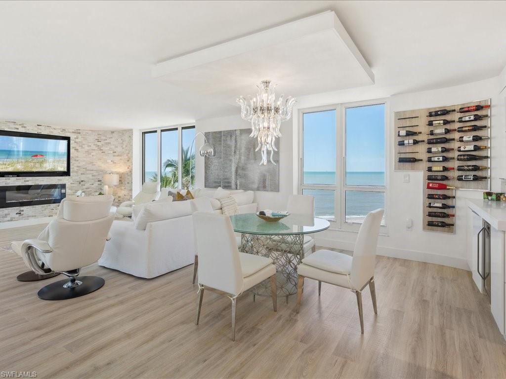Chandelier, Dining room, Interior, Living room, Stone Walls, Water, Wine Storage, Wood Texture Flooring
