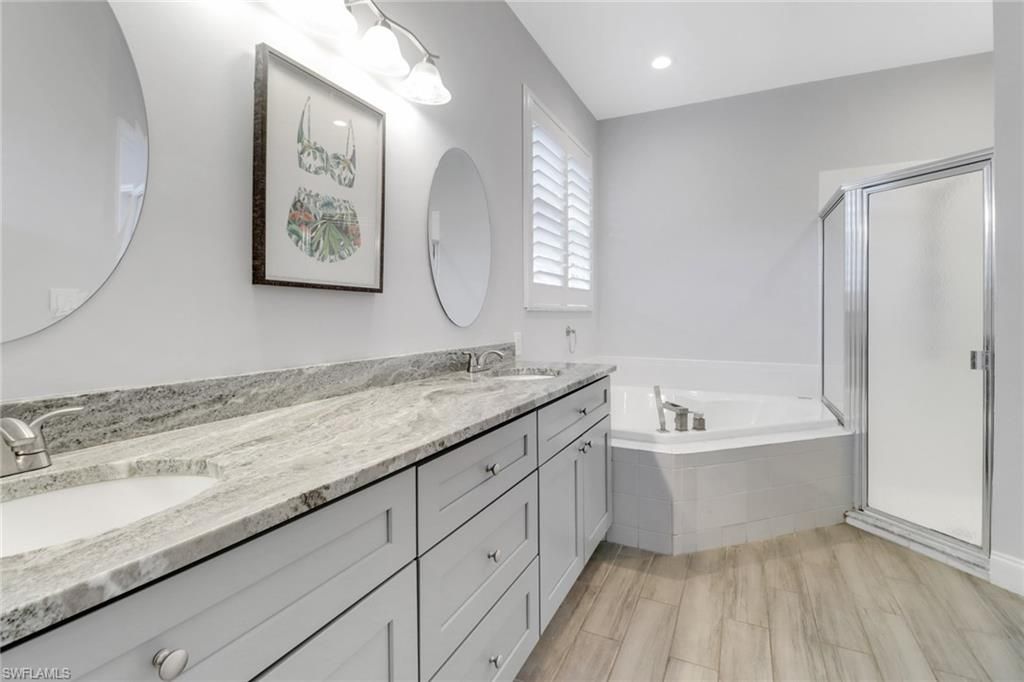 Bathroom, Dual Sink Vanities, Interior, Recessed Lighting, Wood Texture Flooring