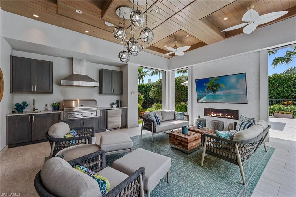 Fireplace, Interior, Kitchen, Living room, Pendant Lights, Recessed Lighting, Stainless Steel Appliances, Wooden Ceilings