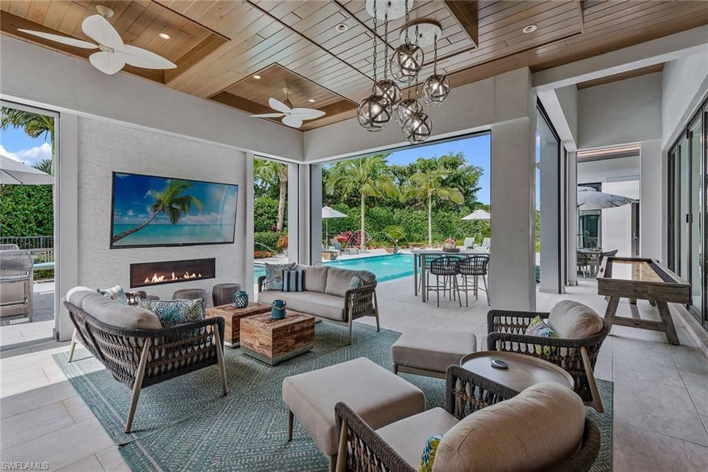 Chandelier, Fireplace, Interior, Living room, Pendant Lights, Recessed Lighting, Wooden Ceilings