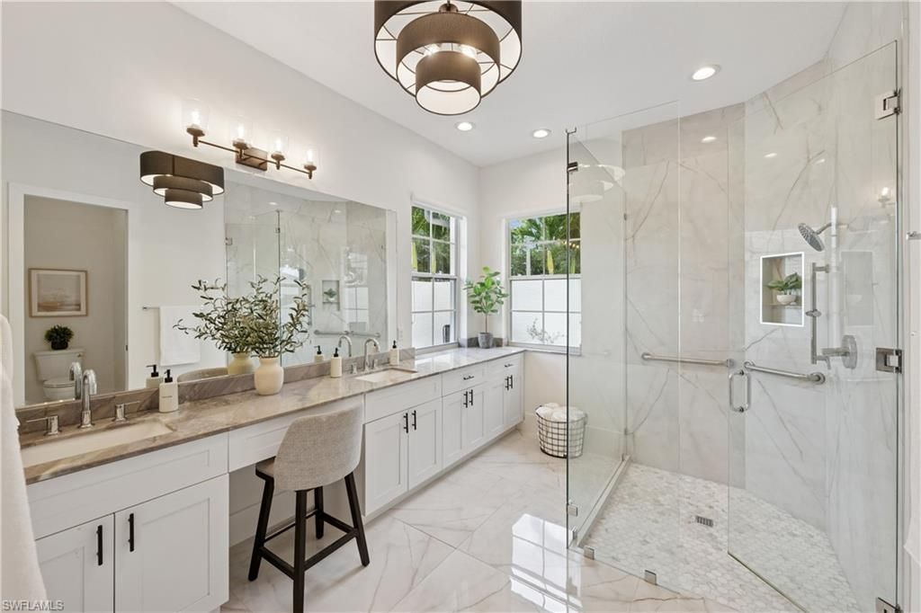 Bathroom, Dual Sink Vanities, Glass Shower, Interior, Marble, Marble Walls, Recessed Lighting
