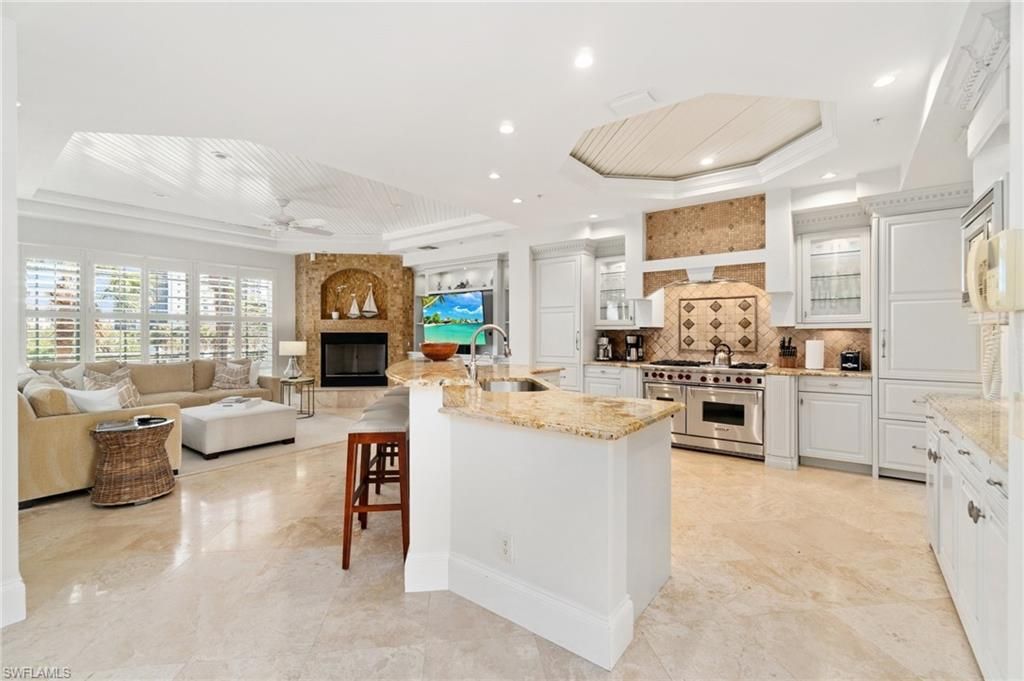 Fireplace, Interior, Kitchen, Living room, Recessed Lighting, Stainless Steel Appliances