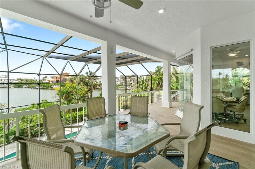 Dining room, Glass Ceilings, Interior, Recessed Lighting, Sun Room, Water, Wood Texture Flooring