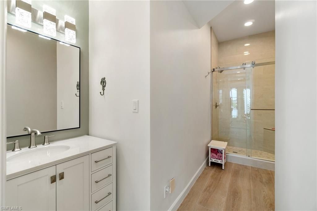 Bathroom, Glass Shower, Interior, Recessed Lighting, Wood Texture Flooring