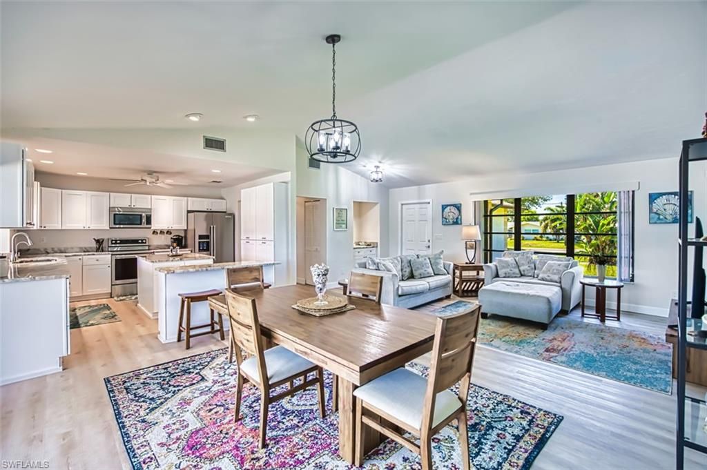 Dining room, Interior, Kitchen, Living room, Pendant Lights, Recessed Lighting, Stainless Steel Appliances, Wood Texture Flooring