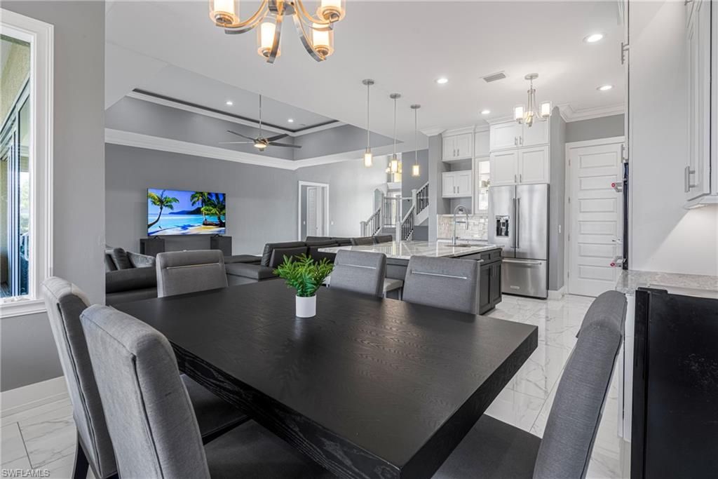 Dining room, Interior, Kitchen, Living room, Marble, Pendant Lights, Recessed Lighting, Stainless Steel Appliances