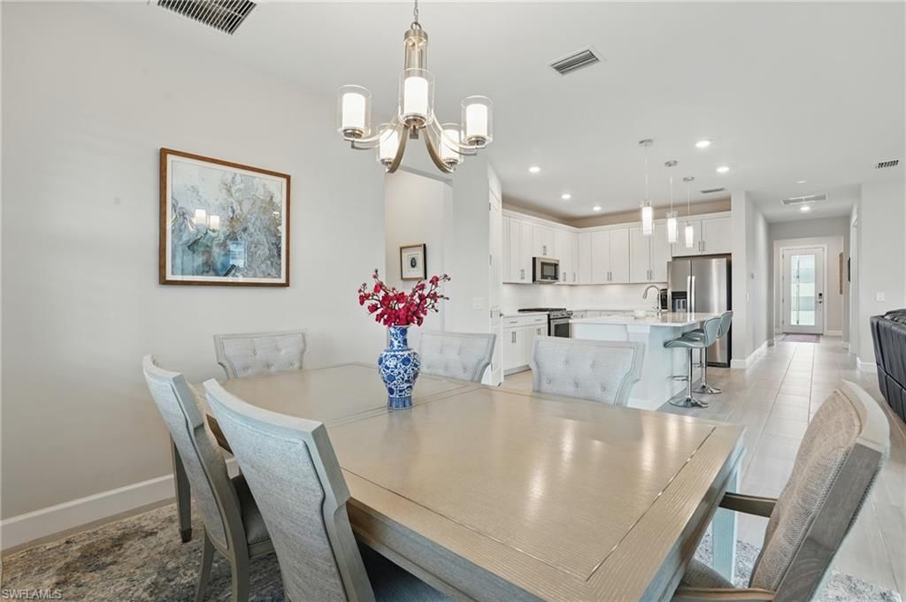 Chandelier, Dining room, Interior, Kitchen, Pendant Lights, Recessed Lighting, Stainless Steel Appliances
