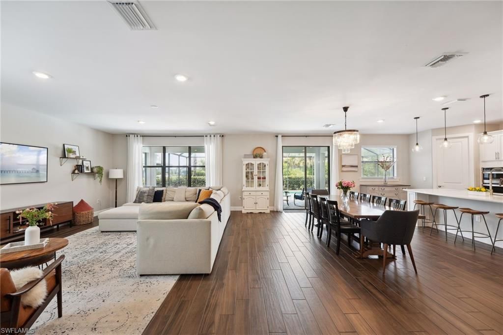 Chandelier, Dining room, Interior, Kitchen, Living room, Pendant Lights, Recessed Lighting, Wood Texture Flooring