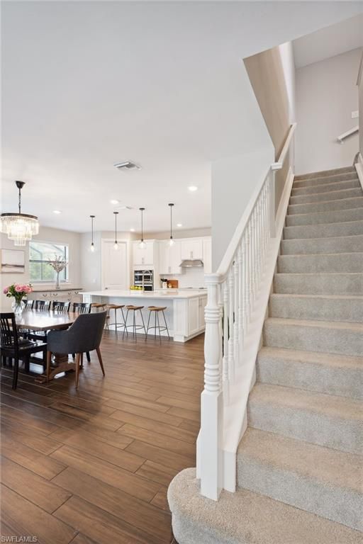 Chandelier, Dining room, Interior, Kitchen, Pendant Lights, Recessed Lighting, Wood Texture Flooring