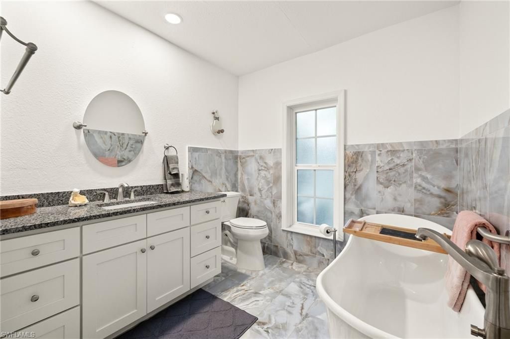 Bathroom, Dual Sink Vanities, Free Standing Baths, Interior, Marble, Recessed Lighting