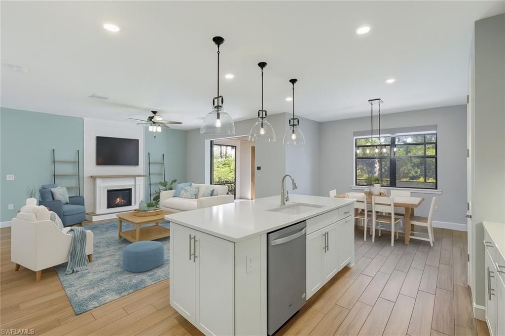 Dining room, Fireplace, Interior, Kitchen, Living room, Pendant Lights, Recessed Lighting, Wood Texture Flooring