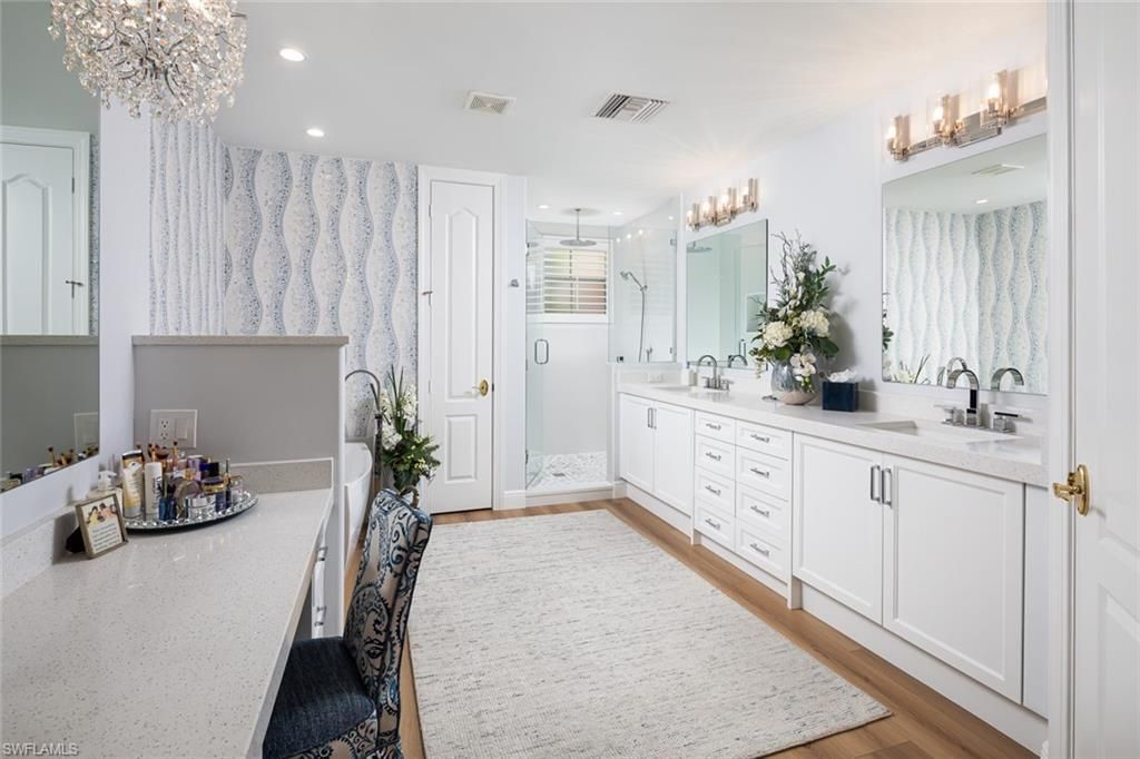 Bathroom, Chandelier, Dual Sink Vanities, Interior, Recessed Lighting, Wood Texture Flooring