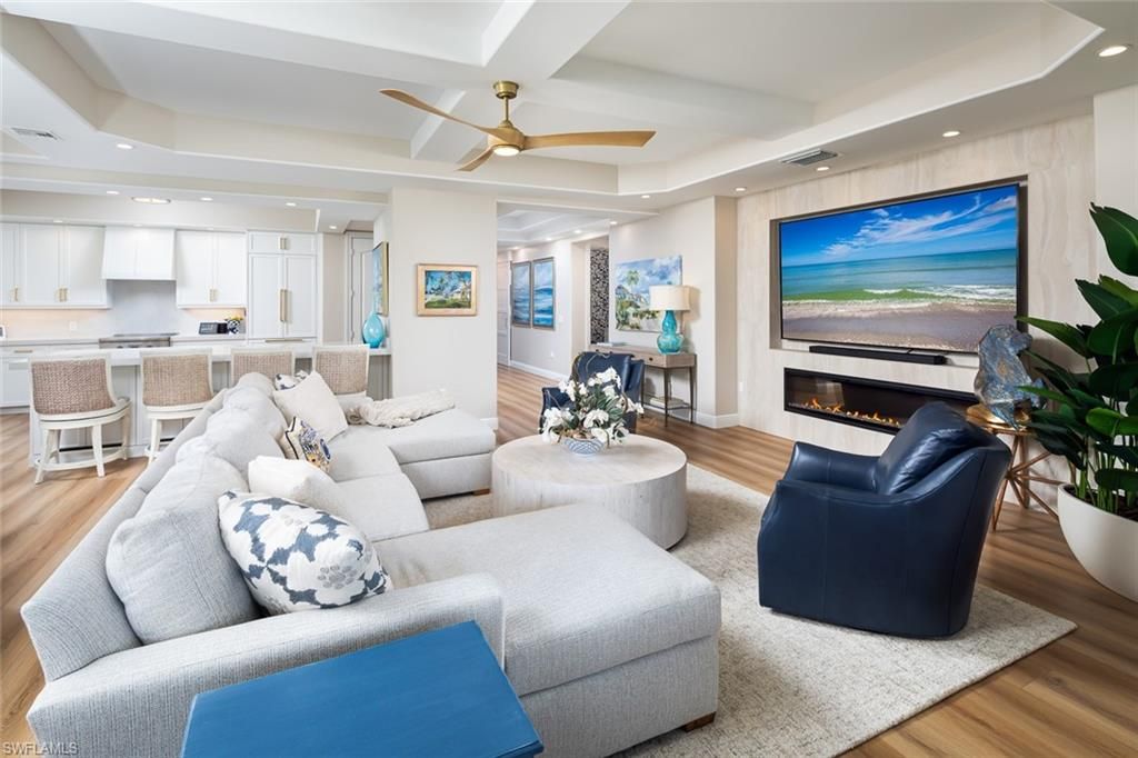Fireplace, Interior, Kitchen, Living room, Recessed Lighting, Stainless Steel Appliances, Wood Texture Flooring