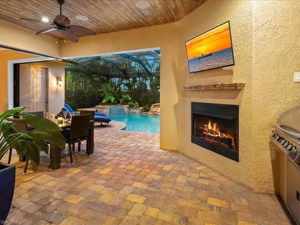 Dining room, Fireplace, Interior, Pool, Recessed Lighting, Sun Room