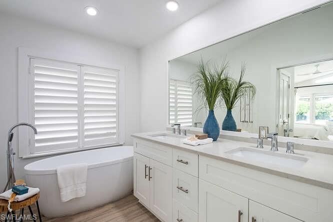 Bathroom, Dual Sink Vanities, Interior, Recessed Lighting, Wood Texture Flooring