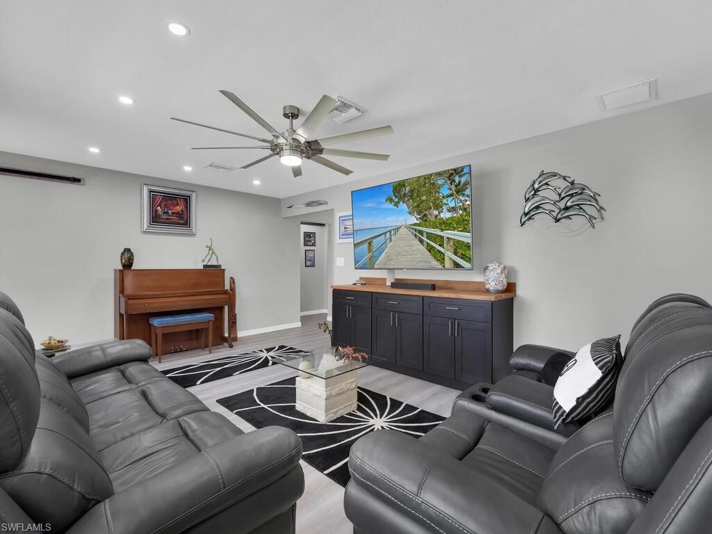 Home Theatre Room, Interior, Living room, Piano, Recessed Lighting, Wood Texture Flooring