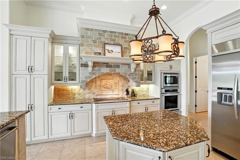 Interior, Kitchen, Pendant Lights, Stainless Steel Appliances, Stone Walls