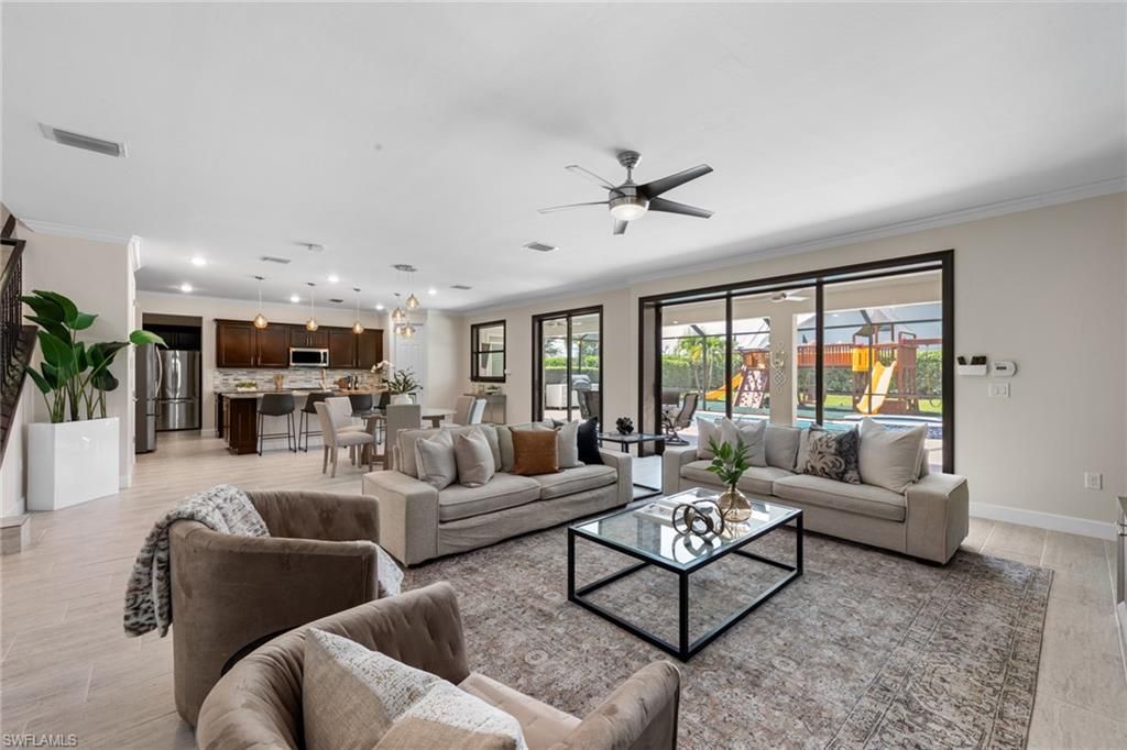 Dining room, Interior, Kitchen, Living room, Pendant Lights, Recessed Lighting, Stainless Steel Appliances, Wood Texture Flooring