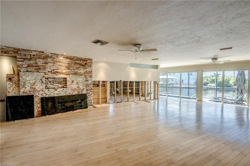 Empty room, Fireplace, Interior, Stone Walls, Wood Texture Flooring