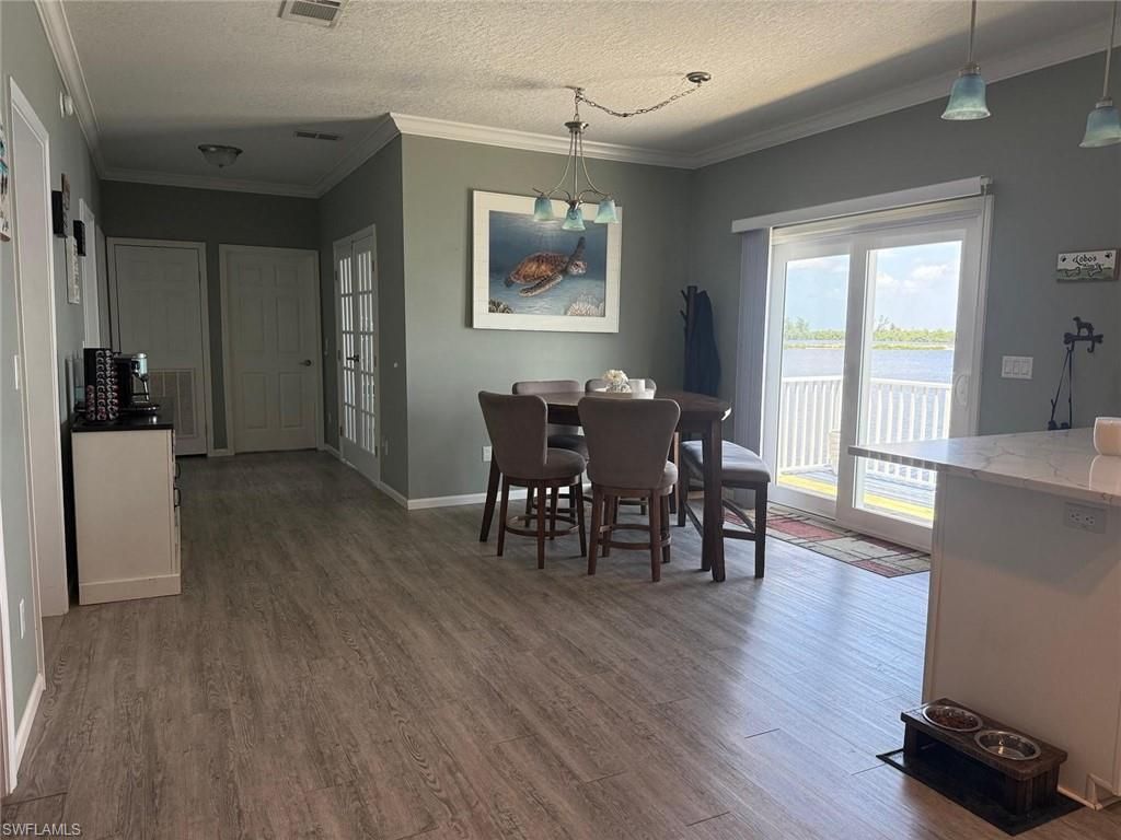 Dining room, Interior, Pendant Lights, Water, Wood Texture Flooring