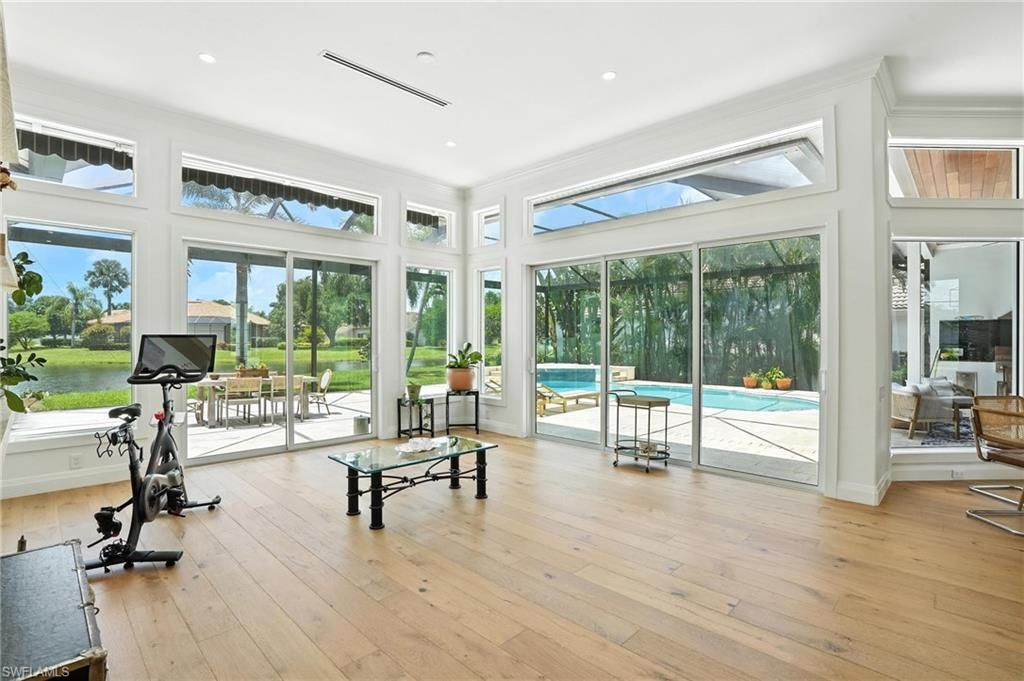 Fitness Equipment, Interior, Recessed Lighting, Sun Room, Water, Wood Texture Flooring