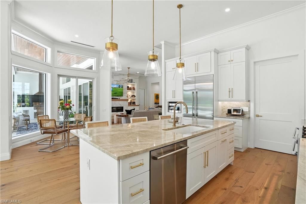 Dining room, Interior, Kitchen, Pendant Lights, Recessed Lighting, Stainless Steel Appliances, Wood Texture Flooring
