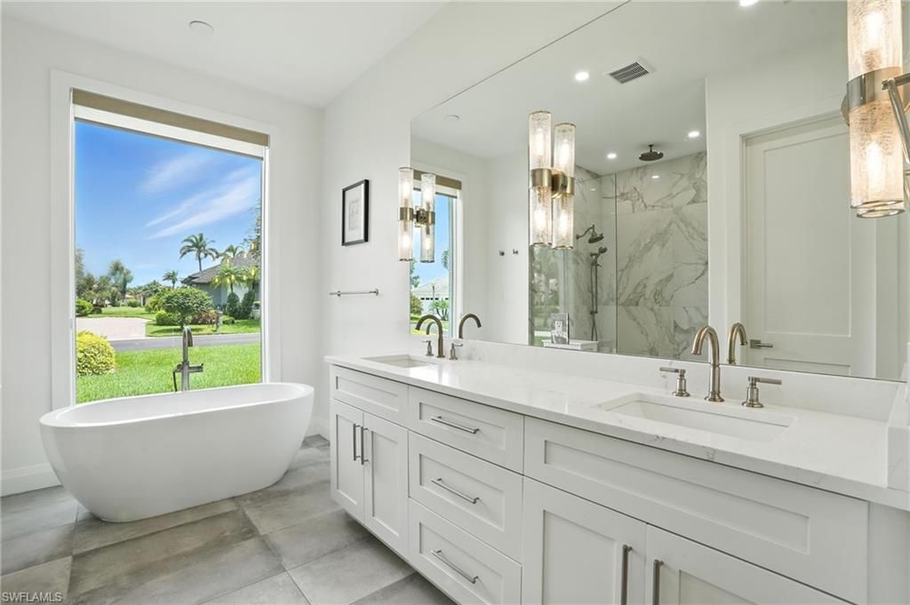 Bathroom, Dual Sink Vanities, Free Standing Baths, Interior, Marble Walls, Recessed Lighting