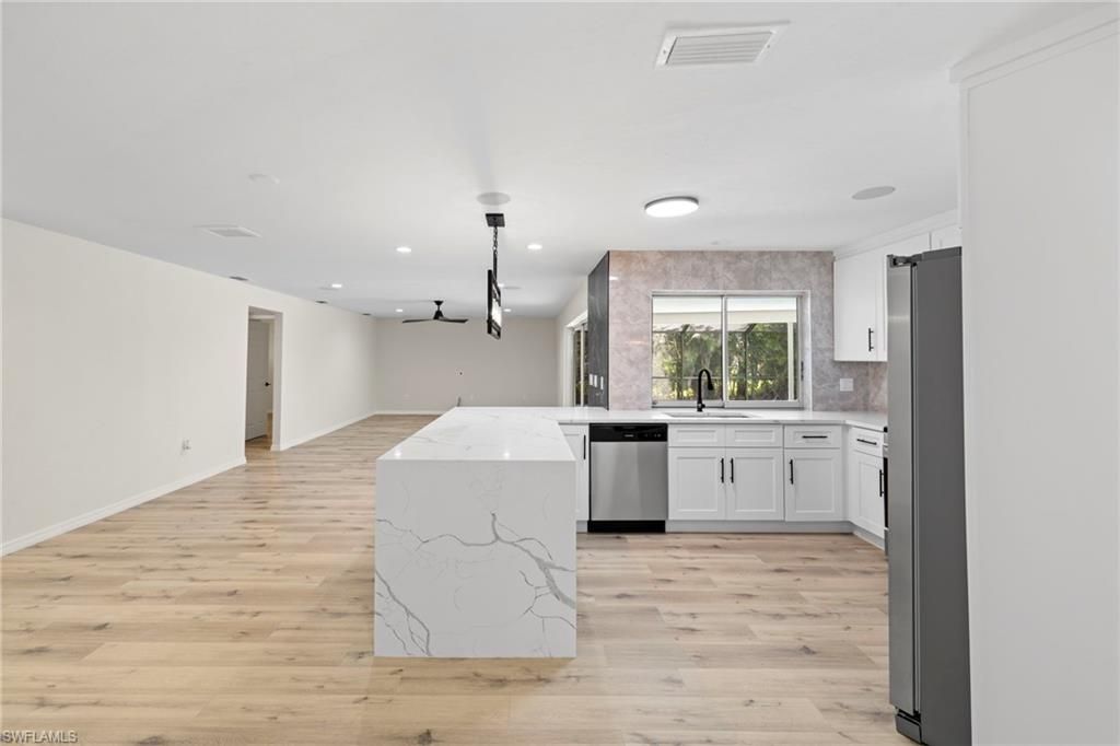 Interior, Kitchen, Pendant Lights, Recessed Lighting, Stainless Steel Appliances, Wood Texture Flooring