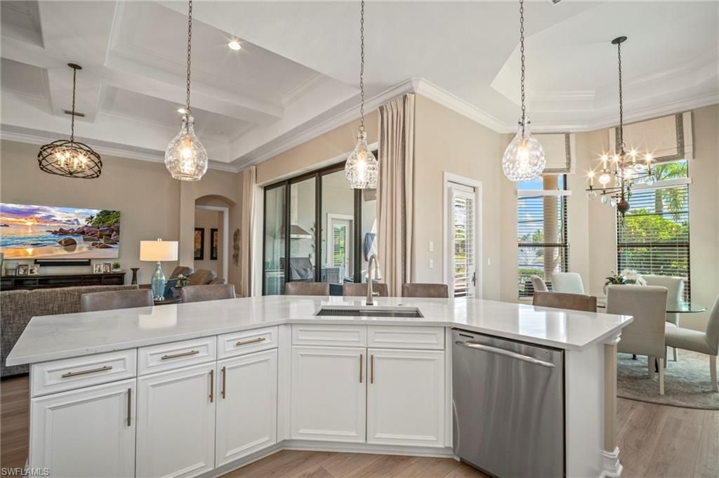 Chandelier, Dining room, Interior, Kitchen, Pendant Lights, Stainless Steel Appliances, Wood Texture Flooring