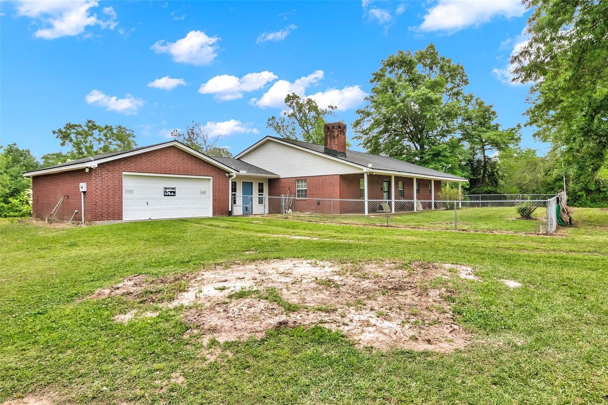 Attached, Backyard, Exterior, Facade, Brick Facade, Ranch