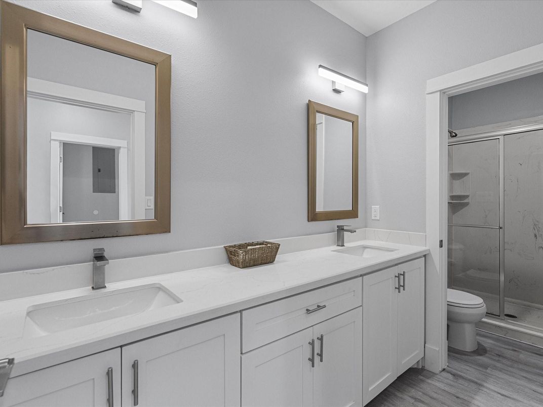 Bathroom, Dual Sink Vanities, Glass Shower, Interior, Wood Texture Flooring