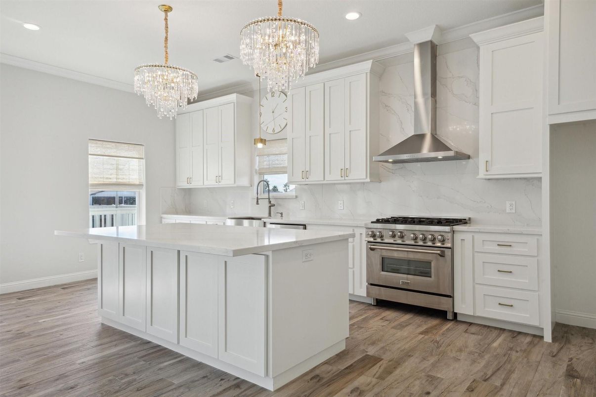 Chandelier, Interior, Kitchen, Marble Walls, Recessed Lighting, Stainless Steel Appliances, Wood Texture Flooring
