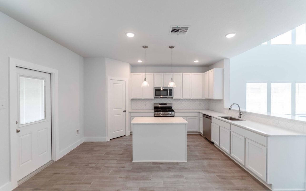 Interior, Kitchen, Pendant Lights, Recessed Lighting, Stainless Steel Appliances, Wood Texture Flooring