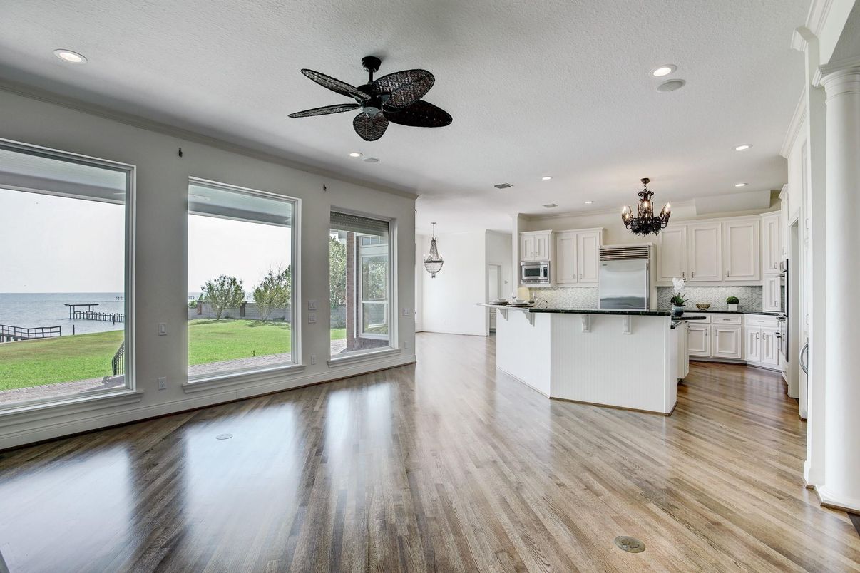 Chandelier, Interior, Kitchen, Recessed Lighting, Stainless Steel Appliances, Water, Wood Texture Flooring