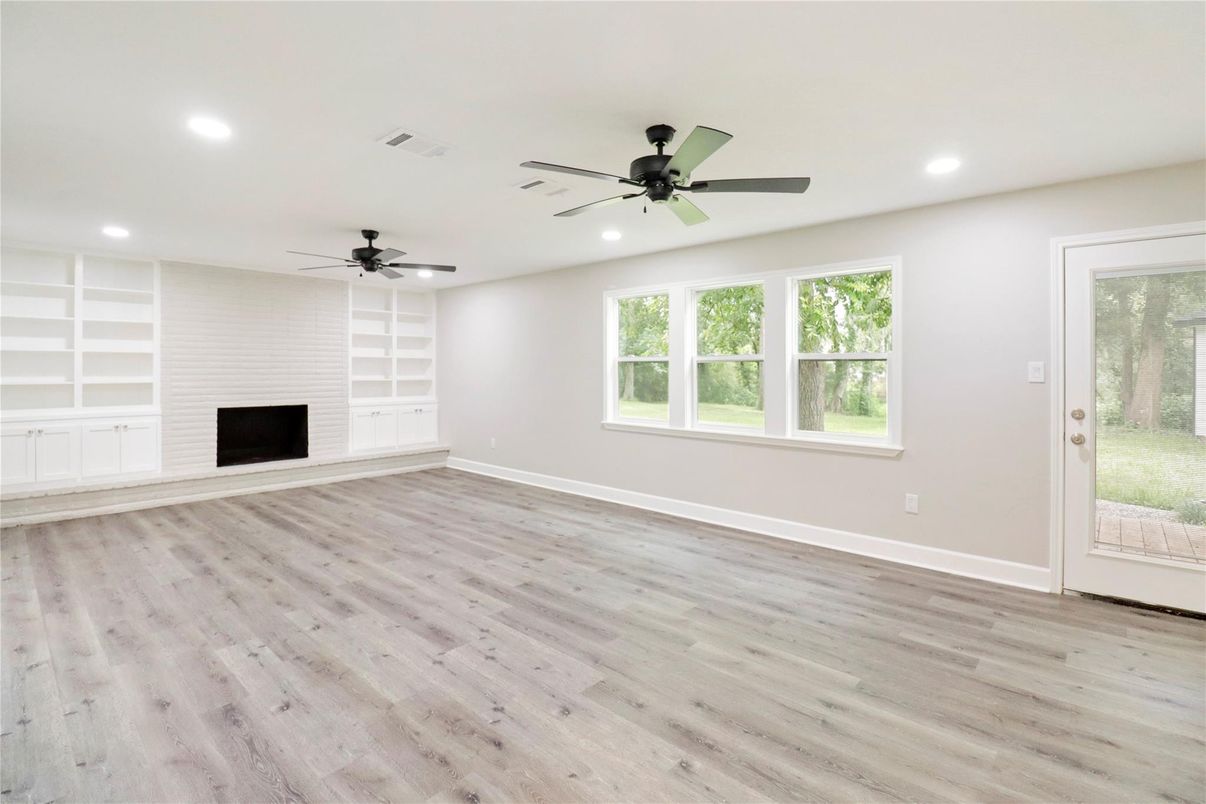 Empty room, Fireplace, Interior, Recessed Lighting, Wood Texture Flooring