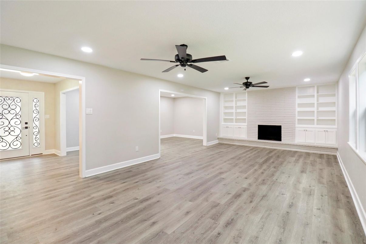 Empty room, Fireplace, Interior, Recessed Lighting, Wood Texture Flooring