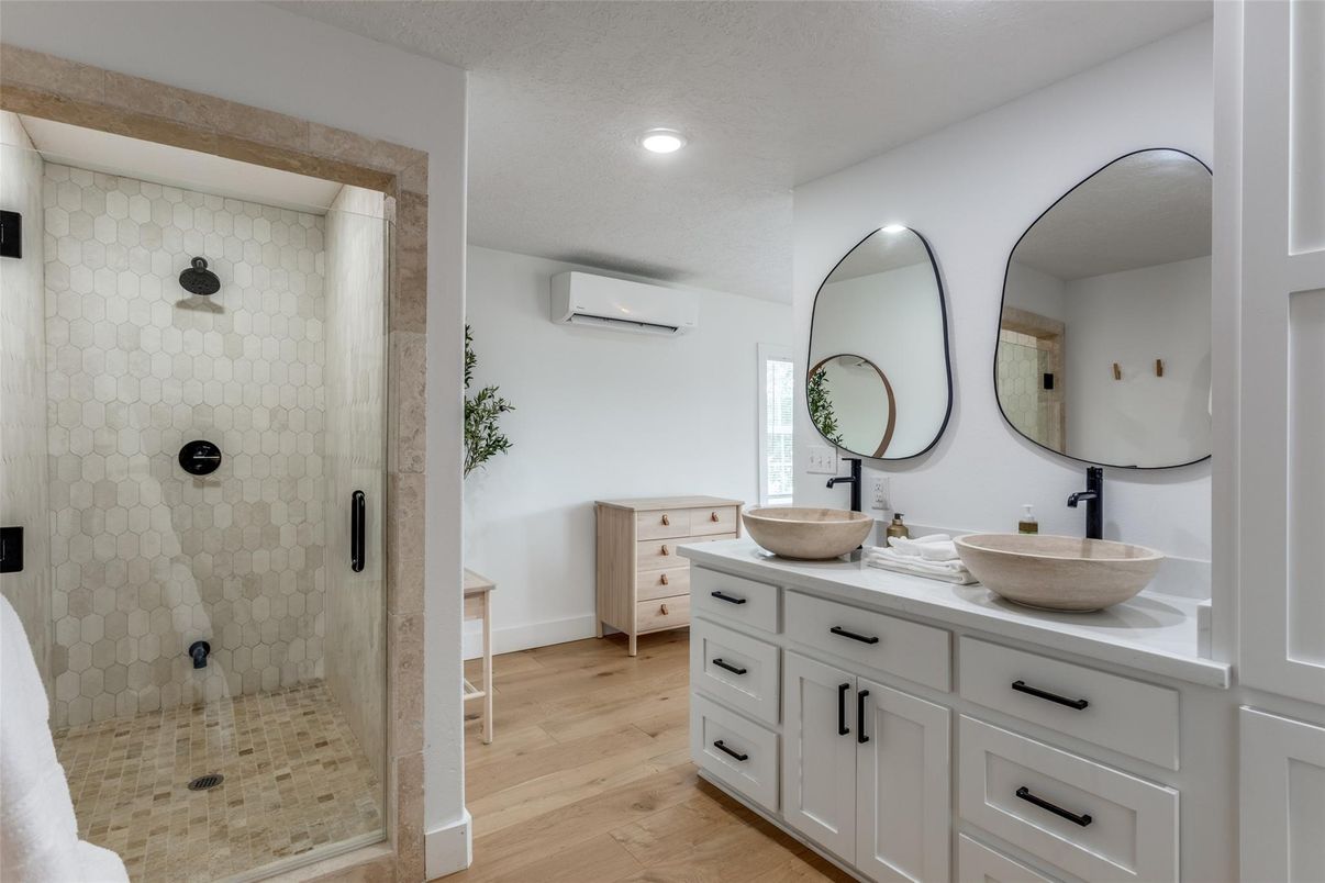 Bathroom, Dual Sink Vanities, Glass Shower, Interior, Recessed Lighting, Wood Texture Flooring